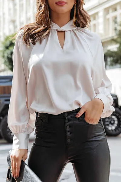 Cutout Mock Neck Long Sleeve Blouse sold by Charming Charlie