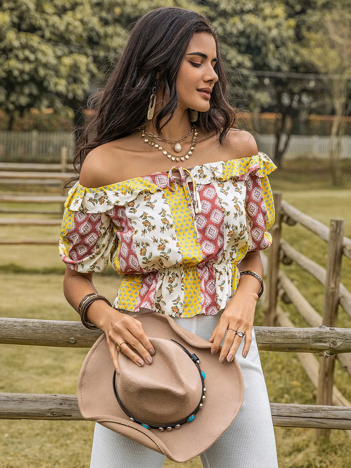Ruffled Printed Off-Shoulder Short Sleeve Blouse sold by Charming Charlie