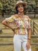 Ruffled Printed Off-Shoulder Short Sleeve Blouse sold by Charming Charlie