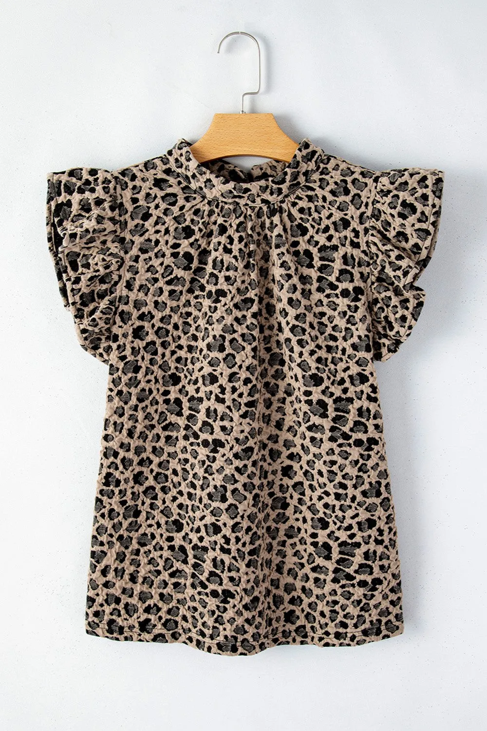 Ruffled Leopard Round Neck Cap Sleeve Blouse sold by Charming Charlie product image thumbnail 5