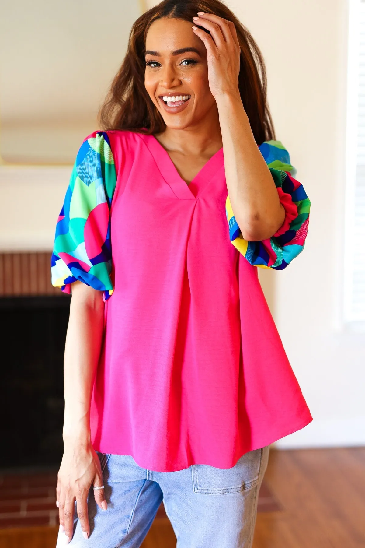 Tell Your Story Fuchsia Geo Print Puff Sleeve V Neck Top sold by Charming Charlie product image thumbnail 2