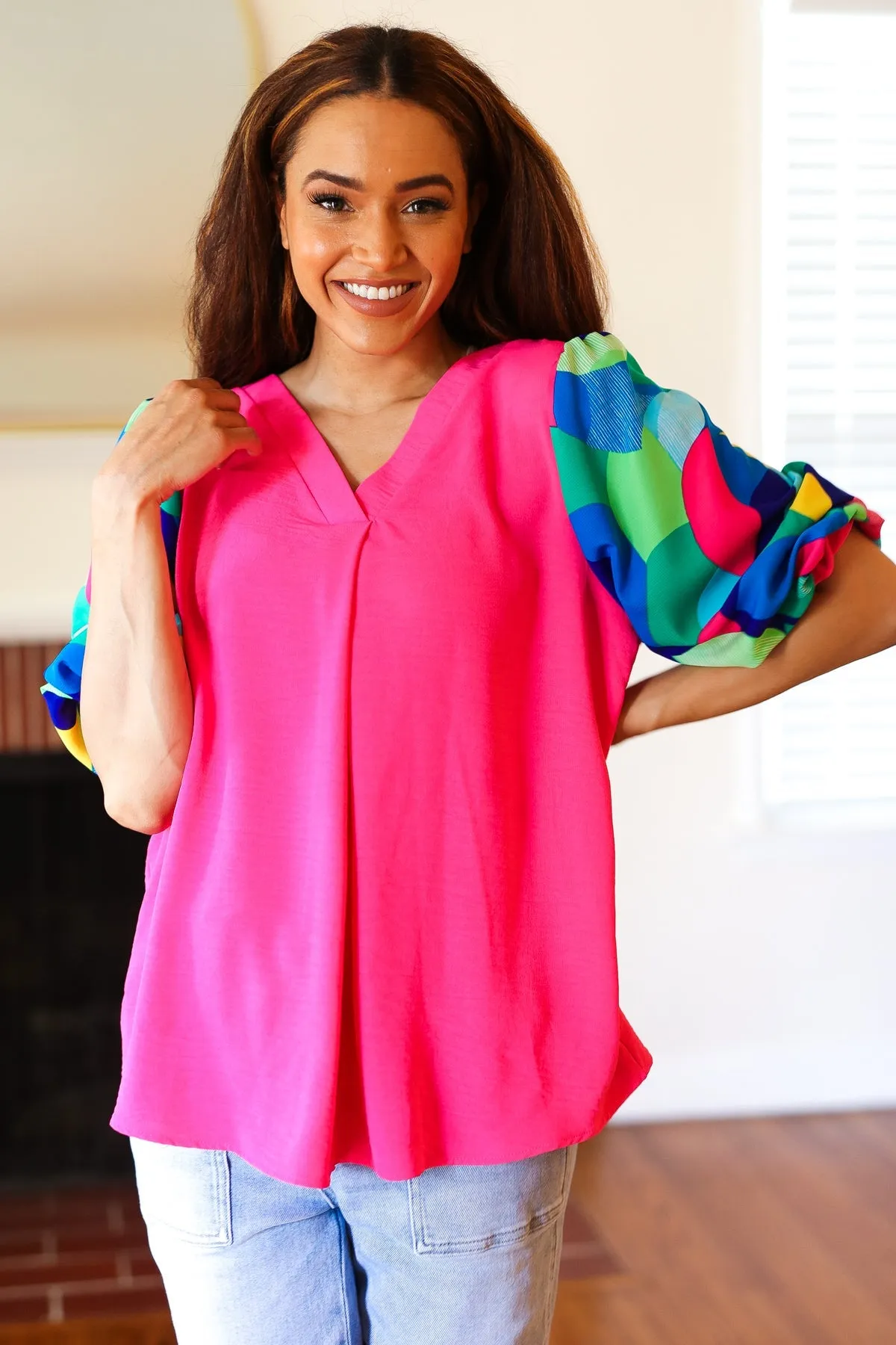 Tell Your Story Fuchsia Geo Print Puff Sleeve V Neck Top sold by Charming Charlie