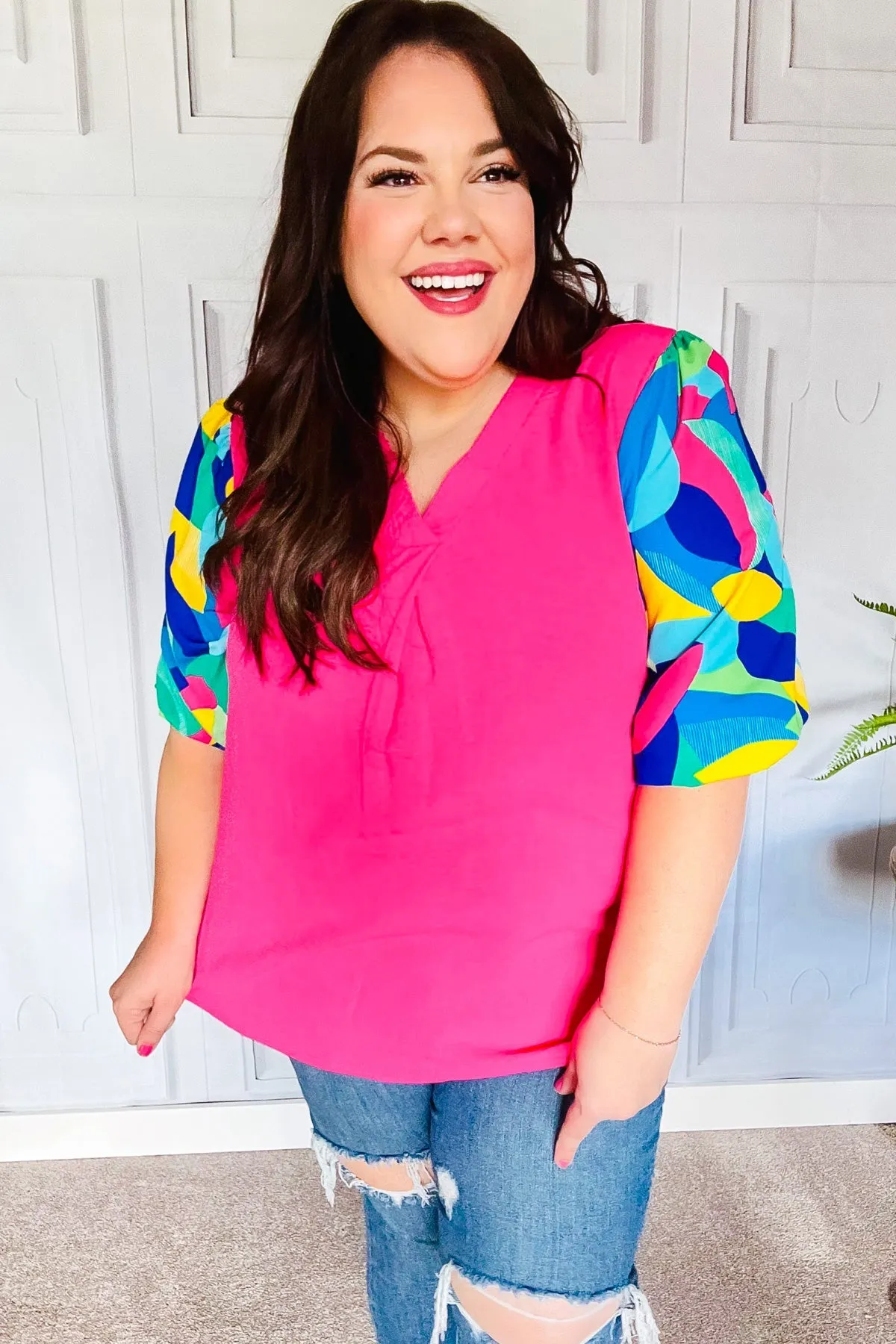 Tell Your Story Fuchsia Geo Print Puff Sleeve V Neck Top sold by Charming Charlie product image thumbnail 5