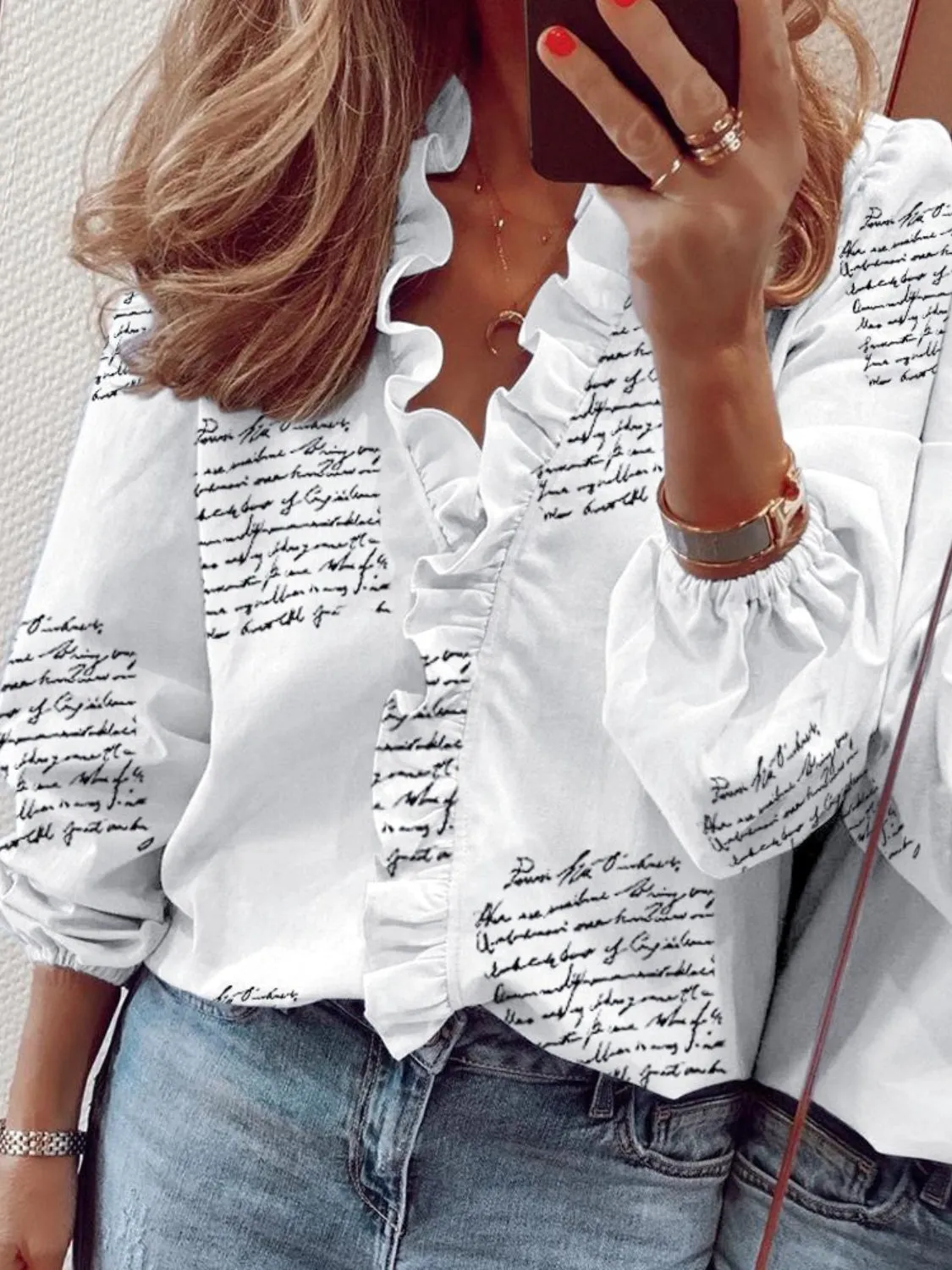 Ruffled Printed V-Neck Long Sleeve Blouse sold by Charming Charlie