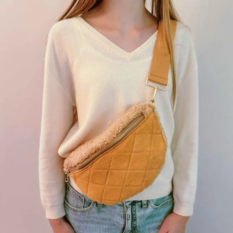 Fuzzy And Quilted Luxe Sling Bag sold by Charming Charlie