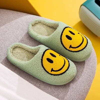 Melody Smiley Face Slippers sold by Charming Charlie