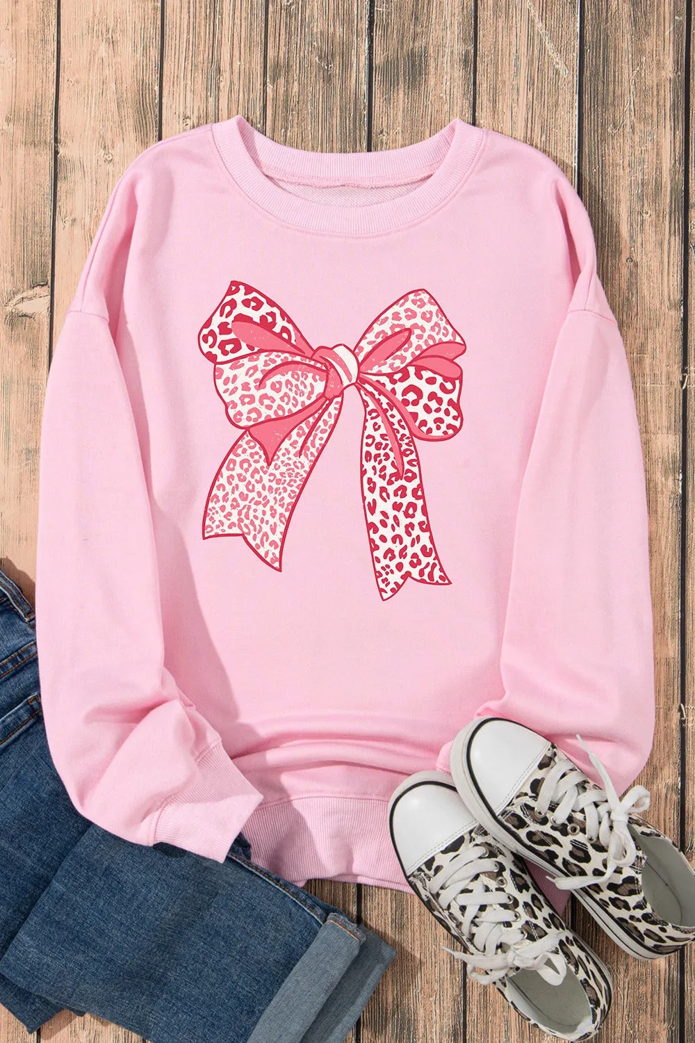 Bow Graphic Round Neck Long Sleeve Sweatshirt sold by Charming Charlie product image thumbnail 4
