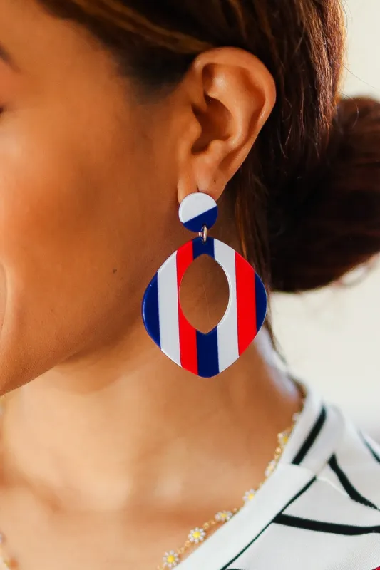 Americana Oval Cut-Out Resin Dangle Earrings sold by Charming Charlie
