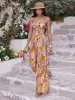 Cutout Printed Spaghetti Strap Jumpsuit sold by Charming Charlie