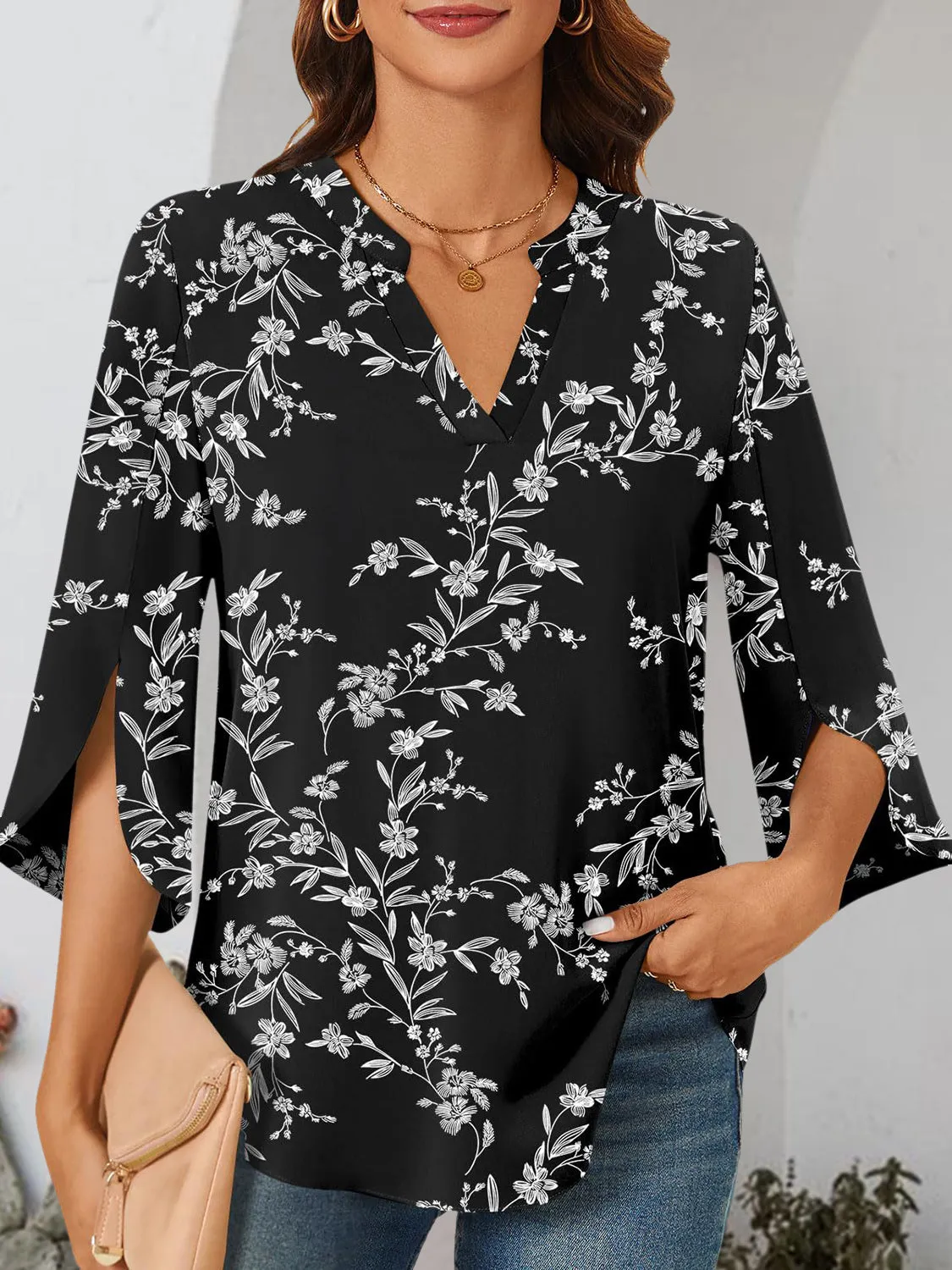 Notched Slit Half Sleeve Blouse sold by Charming Charlie