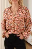 Printed Notched Balloon Sleeve Blouse sold by Charming Charlie