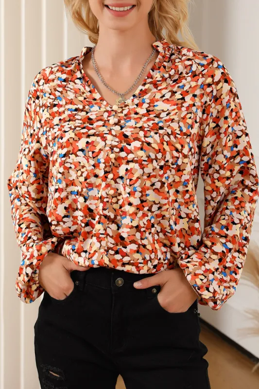 Printed Notched Balloon Sleeve Blouse sold by Charming Charlie