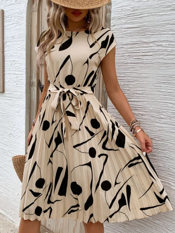 Tied Pleated Printed Cap Sleeve Dress sold by Charming Charlie