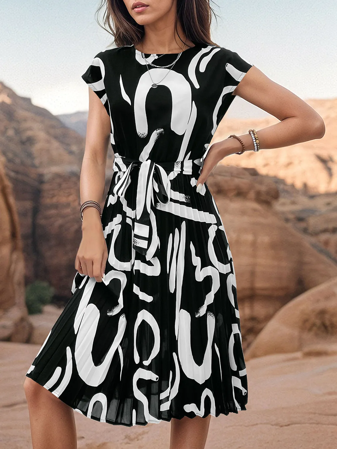 Printed Cap Sleeve Tie Waist Dress sold by Charming Charlie product image thumbnail 2