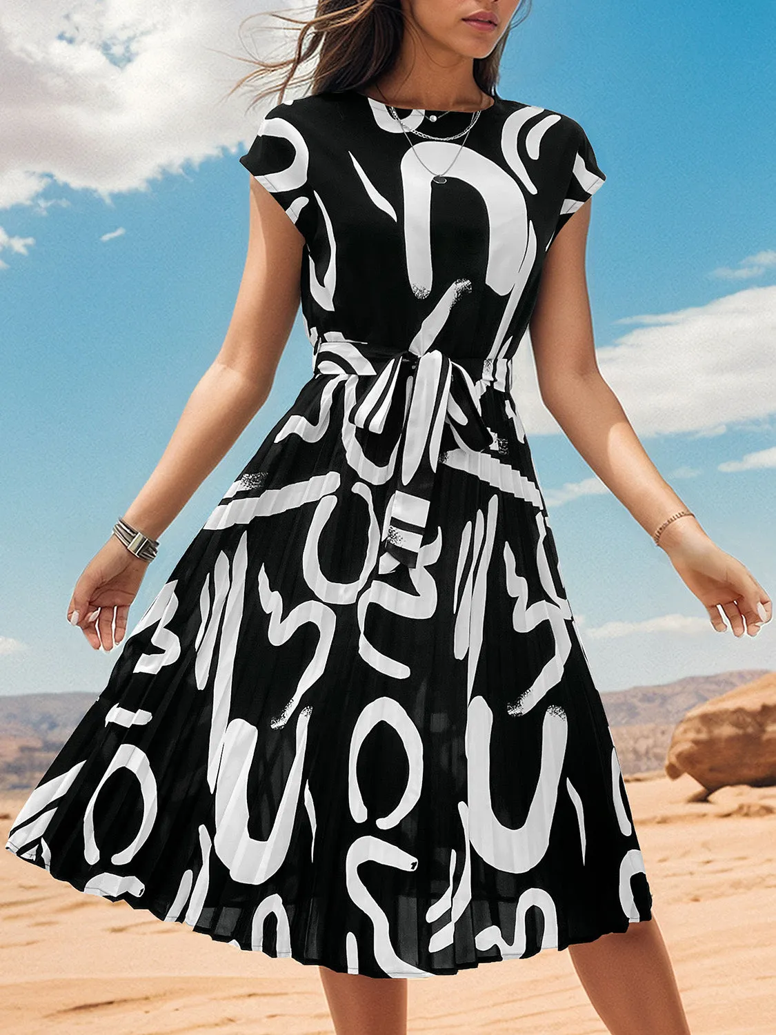 Printed Cap Sleeve Tie Waist Dress sold by Charming Charlie