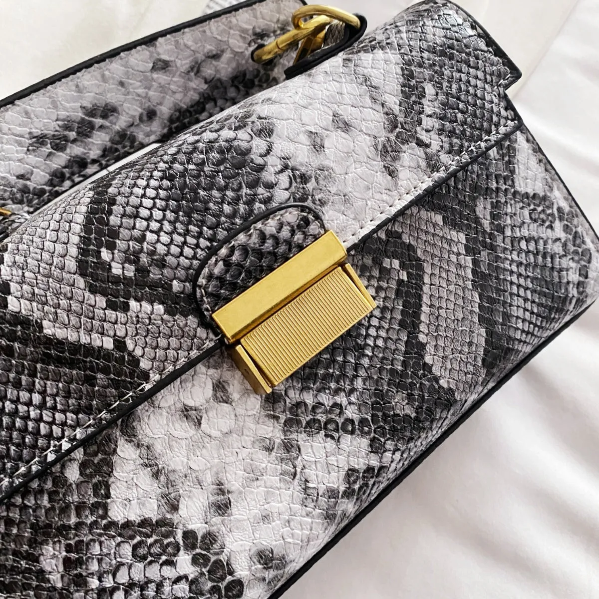 PU Leather Snakeskin Print Crossbody Bag sold by Charming Charlie product image thumbnail 5