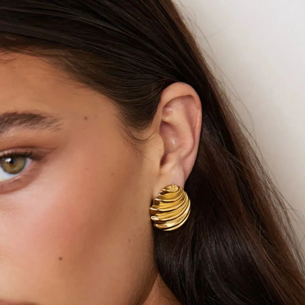 Stainless Steel Shell Shape Stud Earrings sold by Charming Charlie