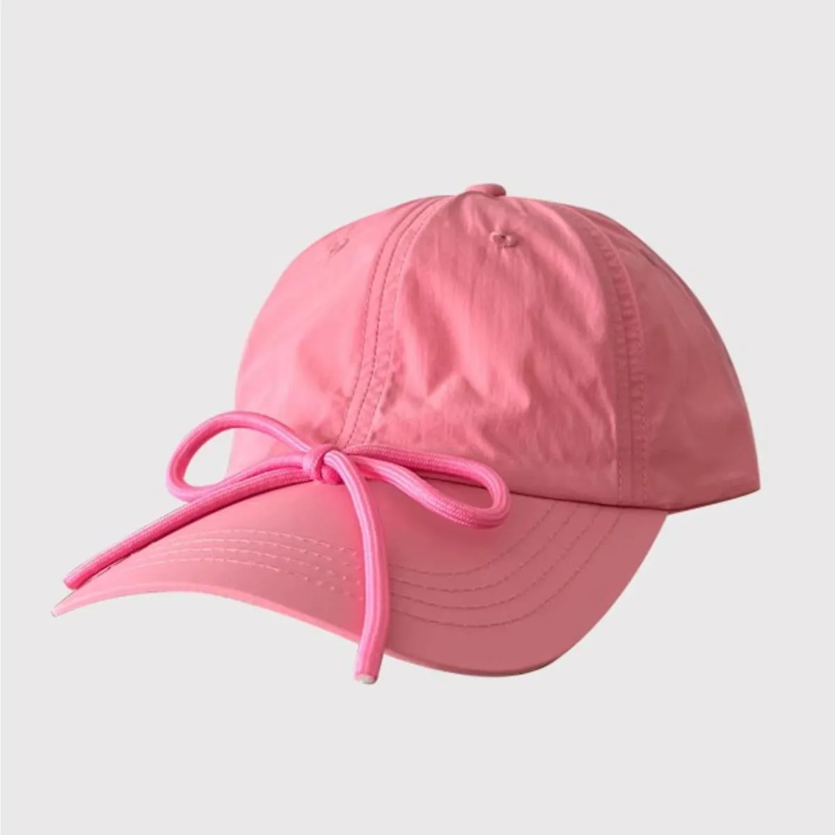 Bow Trim Adjustable Baseball Cap sold by Charming Charlie