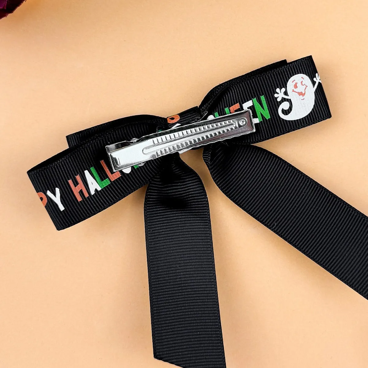 2-Piece Polyester Bow Hair Clip sold by Charming Charlie product image thumbnail 4