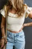 Ruffled Scoop Neck Knit Top sold by Charming Charlie