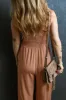 Frill Smocked Wide Leg Jumpsuit sold by Charming Charlie