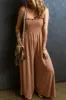 Frill Smocked Wide Leg Jumpsuit sold by Charming Charlie