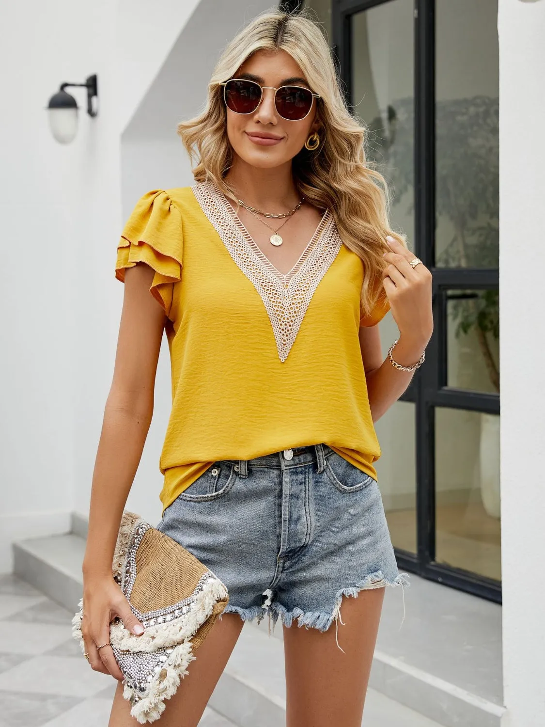 V-Neck Flutter Sleeve Blouse sold by Charming Charlie product image thumbnail 3