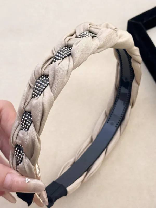 Rhinestone Braided Wide Headband sold by Charming Charlie
