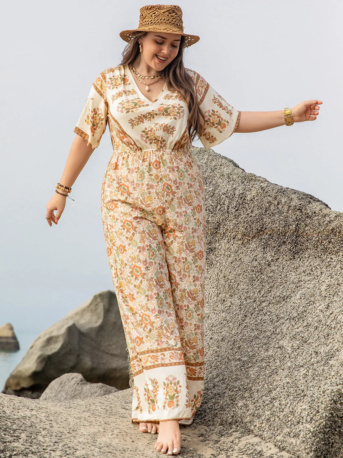 Plus Size V-Neck Flutter Sleeve Wide Leg Jumpsuit sold by Charming Charlie product image thumbnail 3