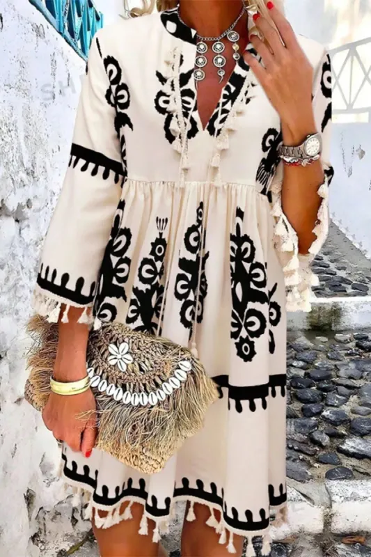 Tassel Printed Three-Quarter Sleeve Mini Dress sold by Charming Charlie