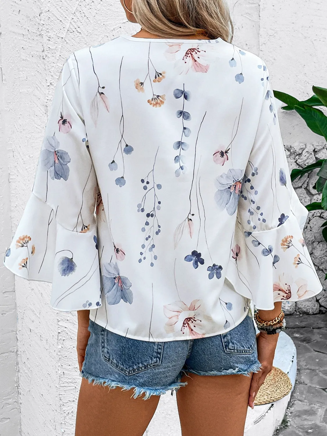 Ruffled Printed V-Neck Half Sleeve Blouse sold by Charming Charlie product image thumbnail 4