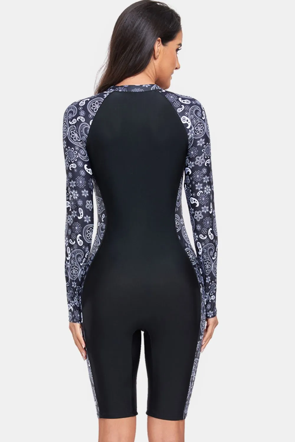Printed Half Zip Long Sleeve One-Piece Swimwear sold by Charming Charlie product image thumbnail 2