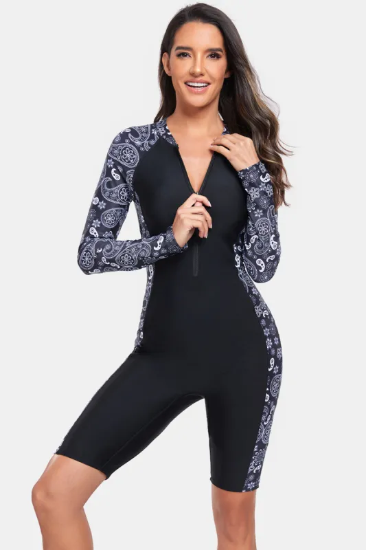 Printed Half Zip Long Sleeve One-Piece Swimwear sold by Charming Charlie