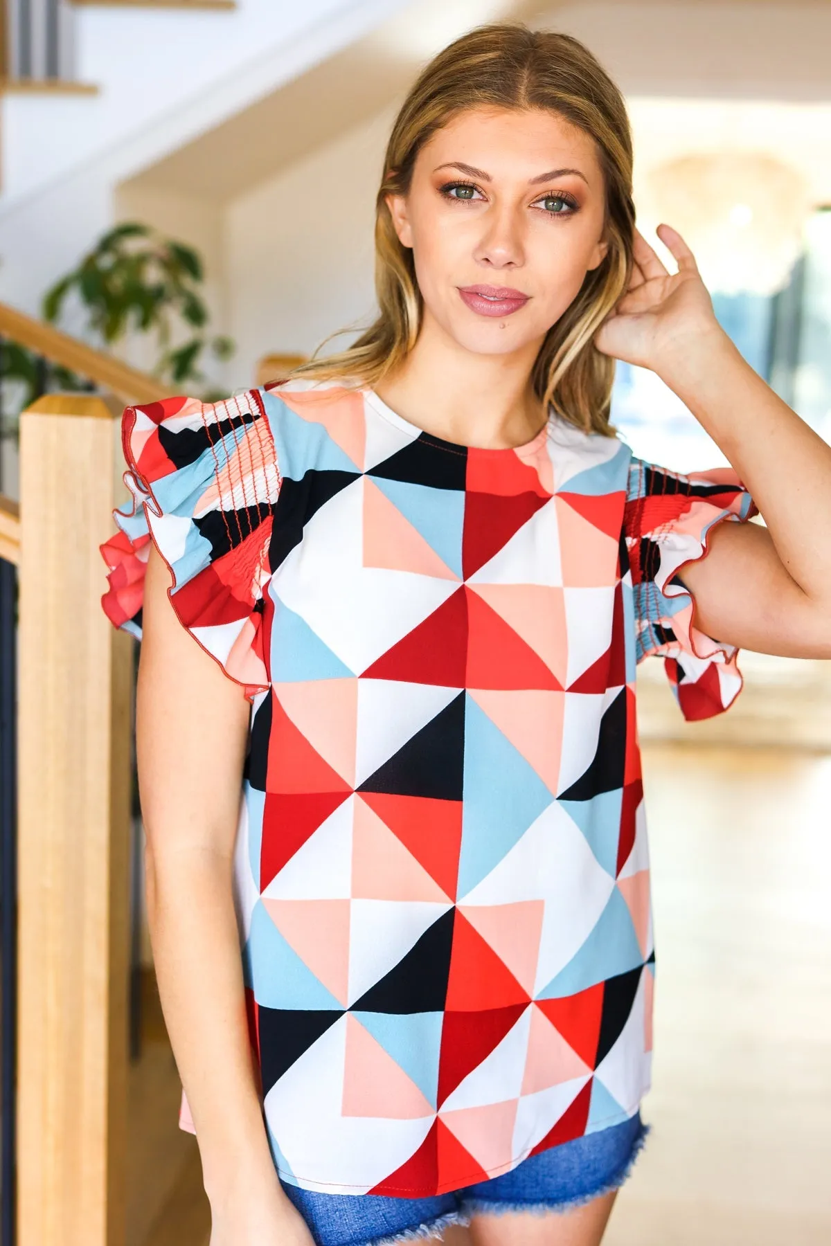 Burnt Orange Geo Print Smocked Ruffle Frill Sleeve Top sold by Charming Charlie product image thumbnail 4