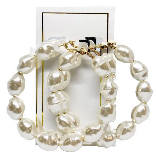 Macy Pearl Hoop sold by Charming Charlie