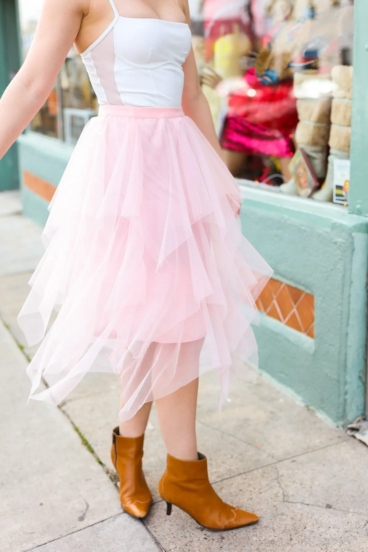 Feeling Femme' Blush Asymmetric Tiered Tulle Midi Skirt sold by Charming Charlie product image thumbnail 5