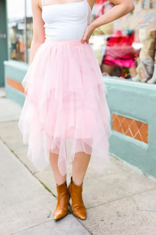 Feeling Femme' Blush Asymmetric Tiered Tulle Midi Skirt sold by Charming Charlie