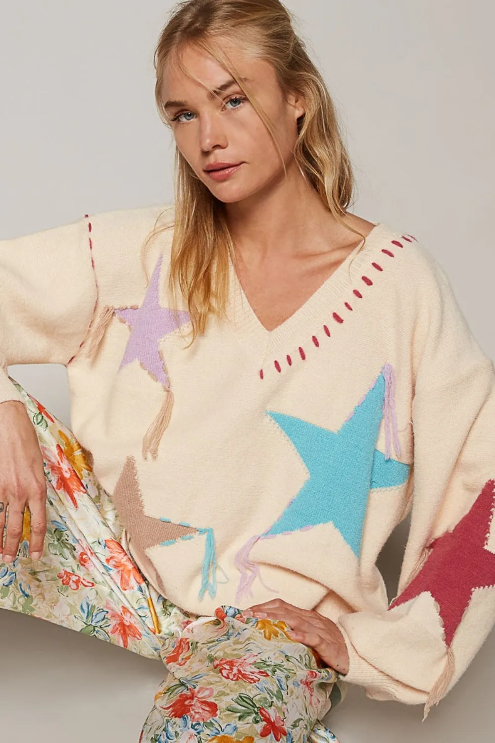 POL V-Neck Long Sleeve Star Fringe Sweater sold by Charming Charlie