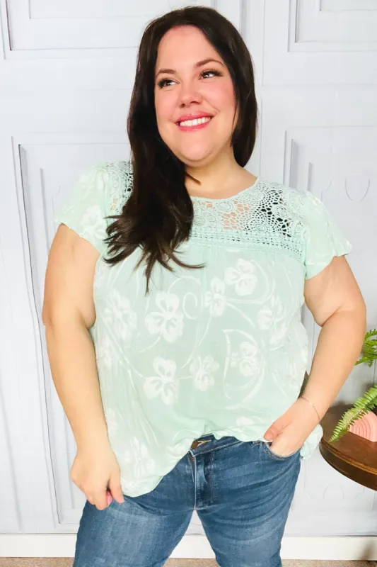 Lovely In Aqua Embroidered Flutter Sleeve Woven Top sold by Charming Charlie