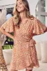 BiBi Floral Tied Short Sleeve Mini Wrap Dress sold by Charming Charlie