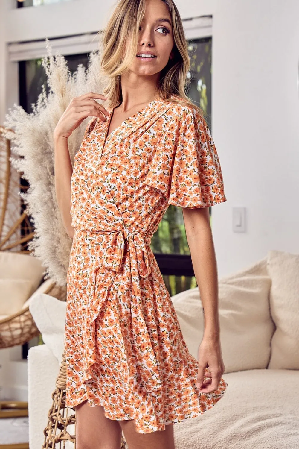 BiBi Floral Tied Short Sleeve Mini Wrap Dress sold by Charming Charlie product image thumbnail 2