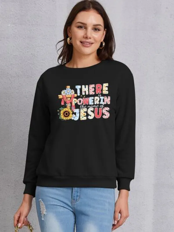 THERE IS POWER IN THE NAME OF JESUS Round Neck Sweatshirt sold by Charming Charlie