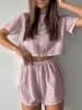 Eyelet Round Neck Top and Shorts Set sold by Charming Charlie