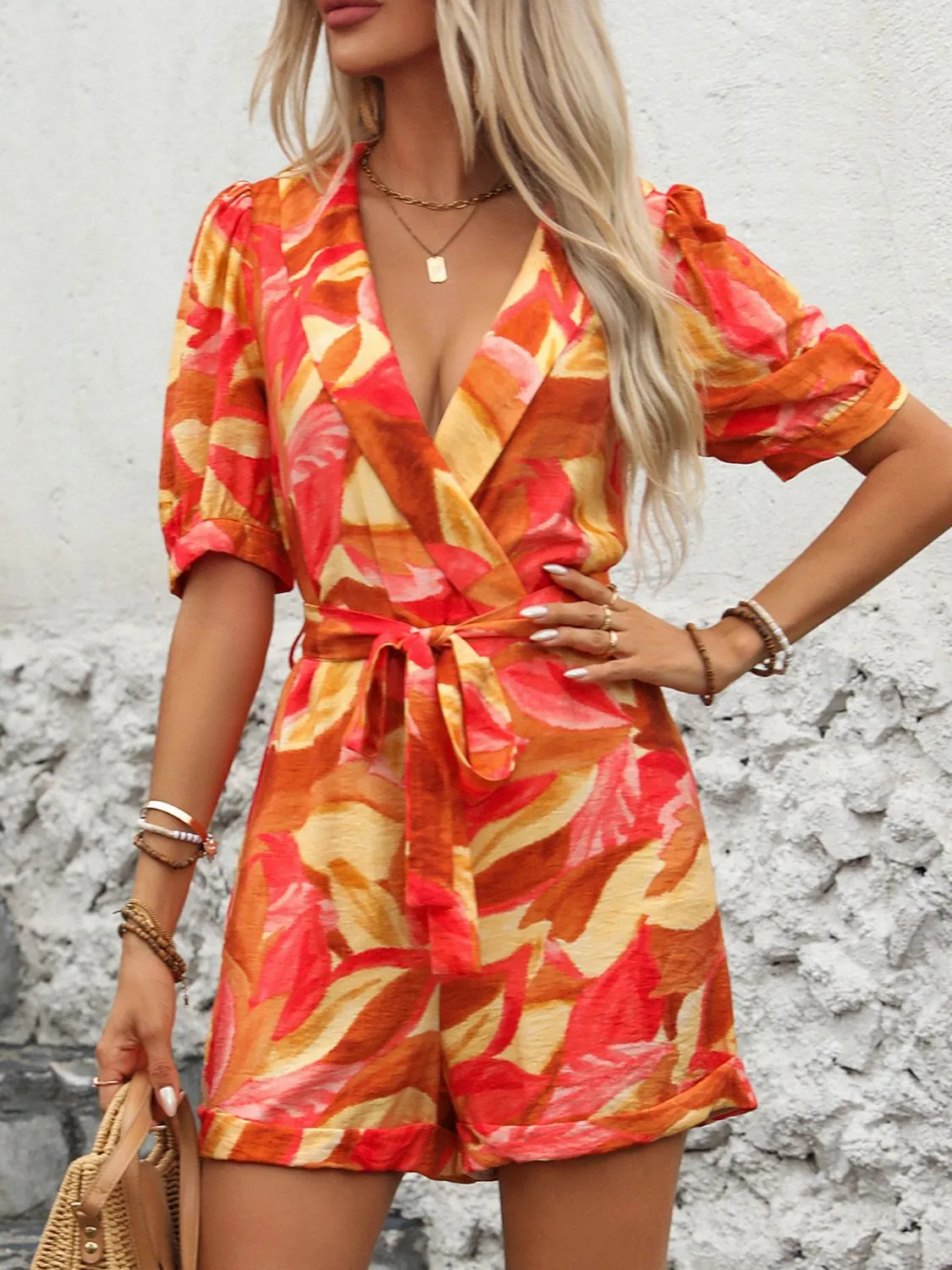 Printed Surplice Half Sleeve Romper sold by Charming Charlie product image thumbnail 3