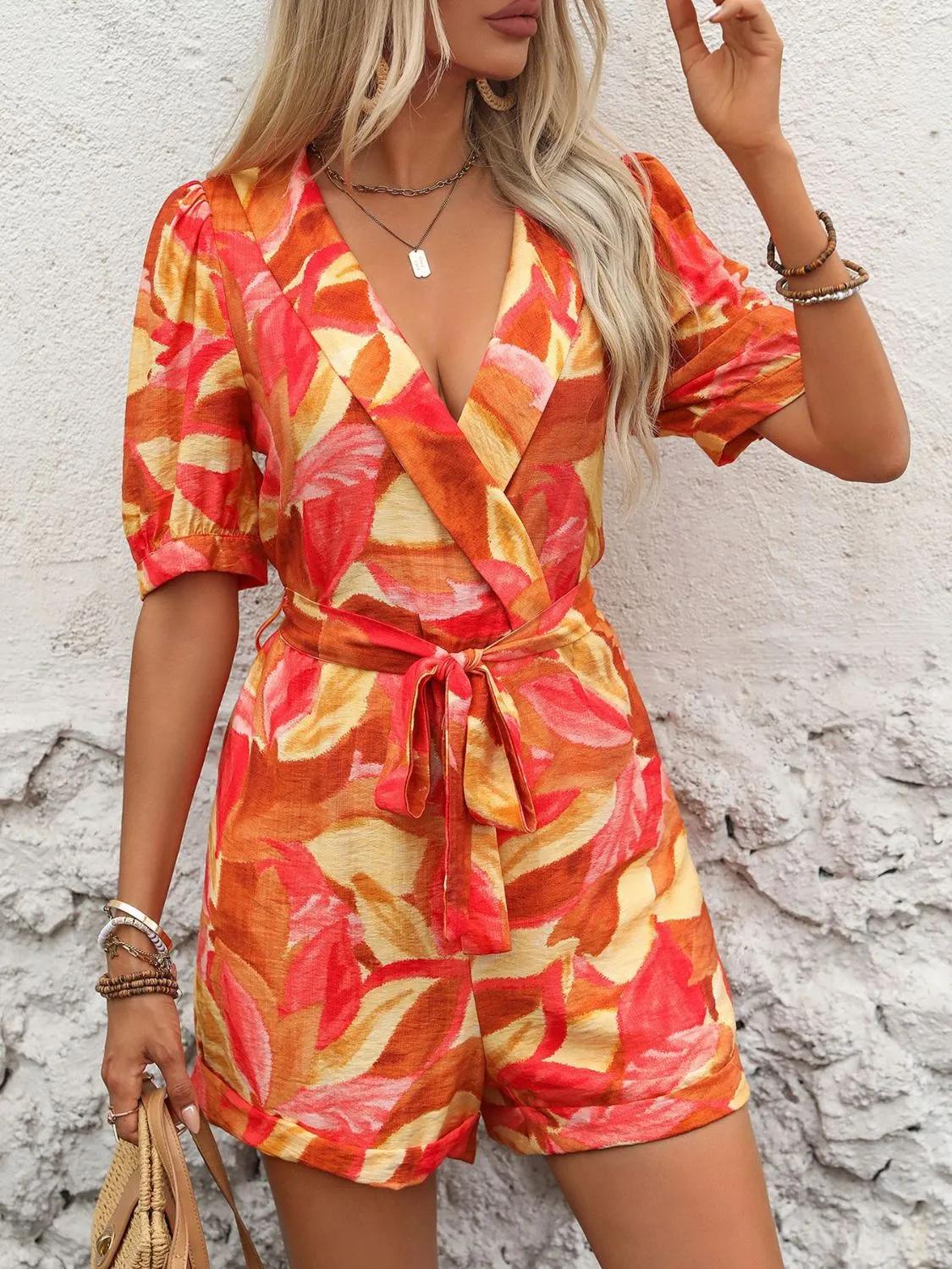 Printed Surplice Half Sleeve Romper sold by Charming Charlie product image thumbnail 5