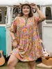 Plus Size Ruched Printed Half Sleeve Mini Dress sold by Charming Charlie