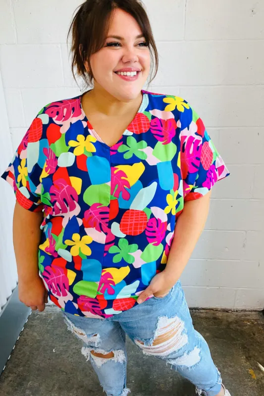 Time For Sun Navy Multicolor Tropical Print V Neck Top sold by Charming Charlie