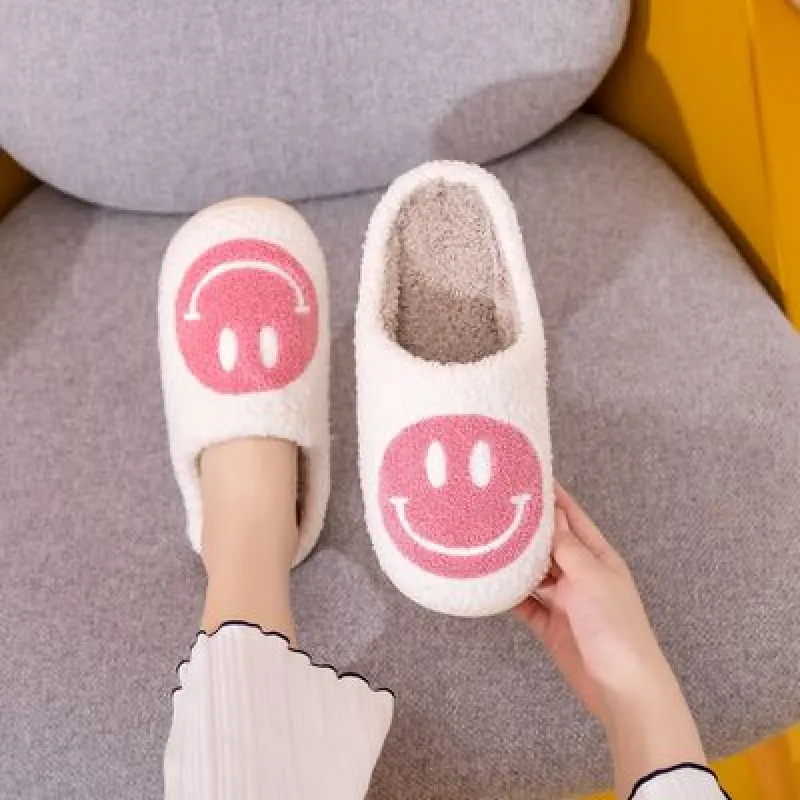 Melody Smiley Face Slippers sold by Charming Charlie