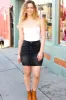 Judy Blue Let's Go Black High Rise Distressed Frayed Denim Skirt sold by Charming Charlie