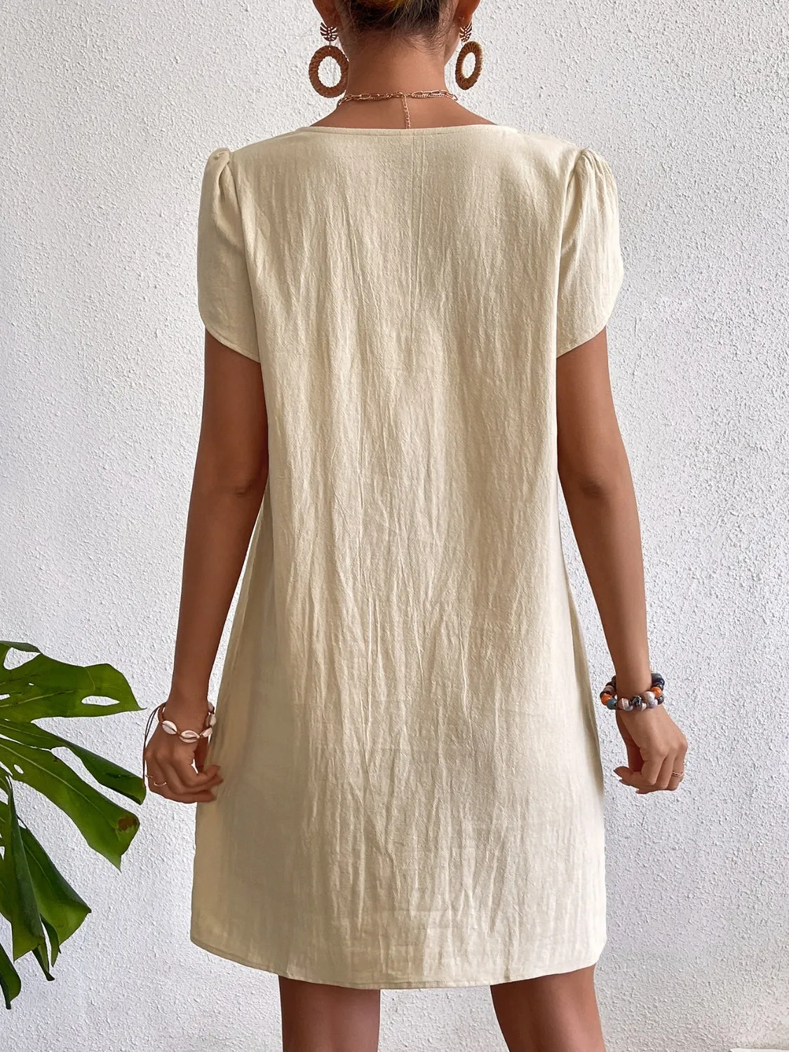 Decorative Button Asymmetrical Neck Short Sleeve Dress sold by Charming Charlie product image thumbnail 2